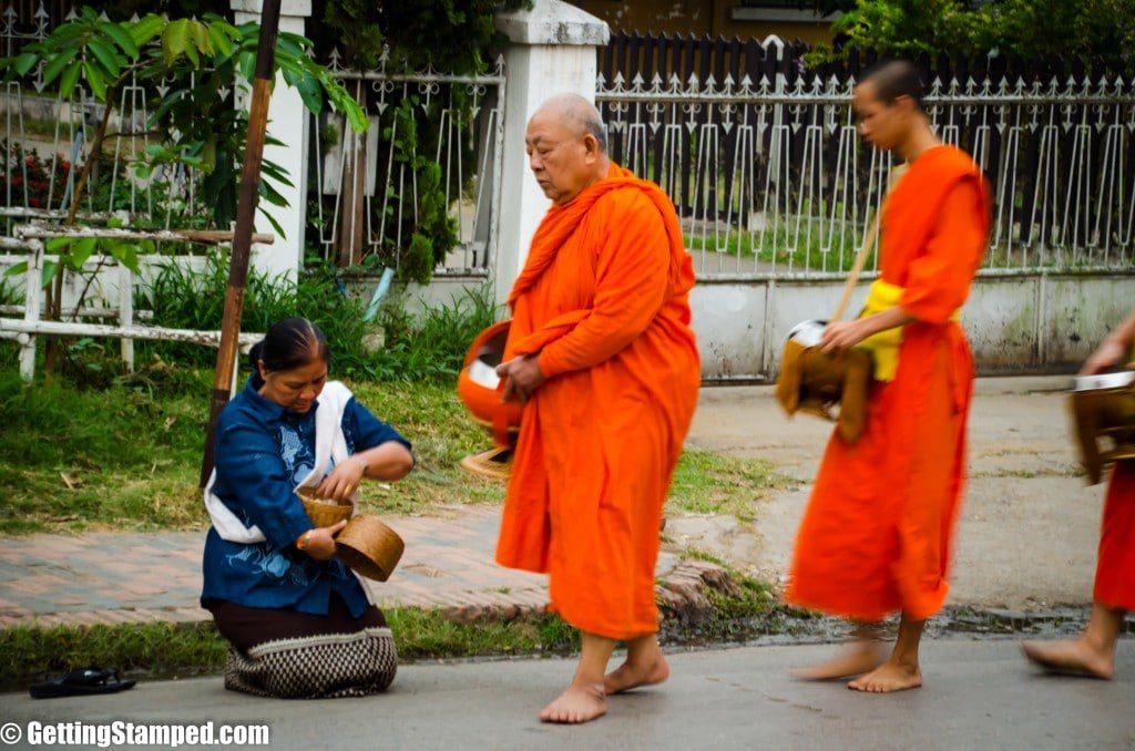 Theravada monks performing alms rounds.